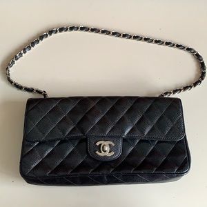 Chanel east west flap bag in black lamb skin leather with silver hardware